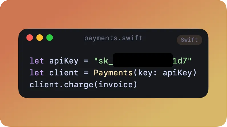 A code card with a solid black bar covering the middle of an API key.